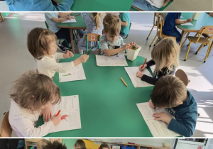 Dzieci kolorują przy stolikach